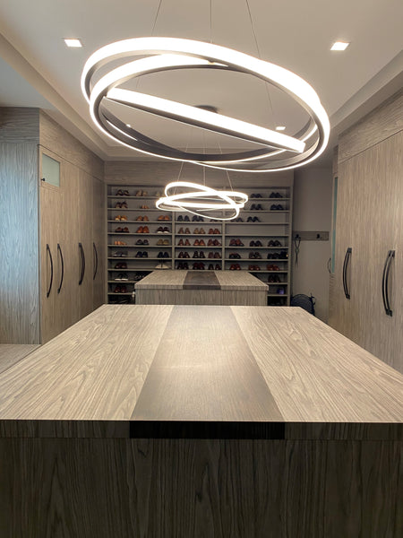 Elegant master closet with dual islands