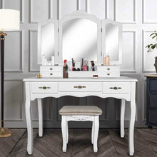 Load image into Gallery viewer, Selection vanity beauty station tri folding necklace hooked mirrors 6 organization 7 drawers makeup dress table with cushioned stool and storage ottoman white